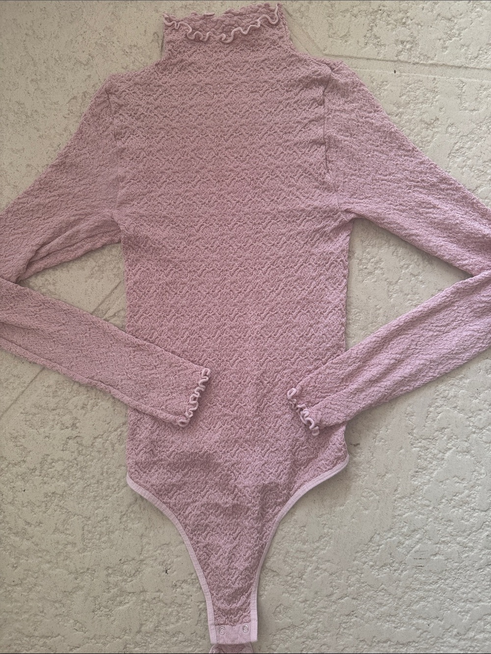 Ruffle-Trim Long Sleeve Bodysuit in Dusty Pink